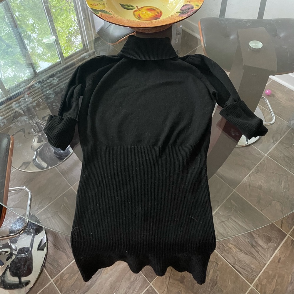 Black Poof turtleneck. 2/$25
